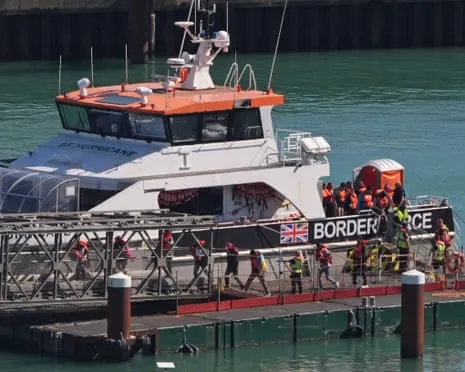 British Ministers Affirm Migrant Returns Agreement with France Goes Ahead Amid Court Injunction